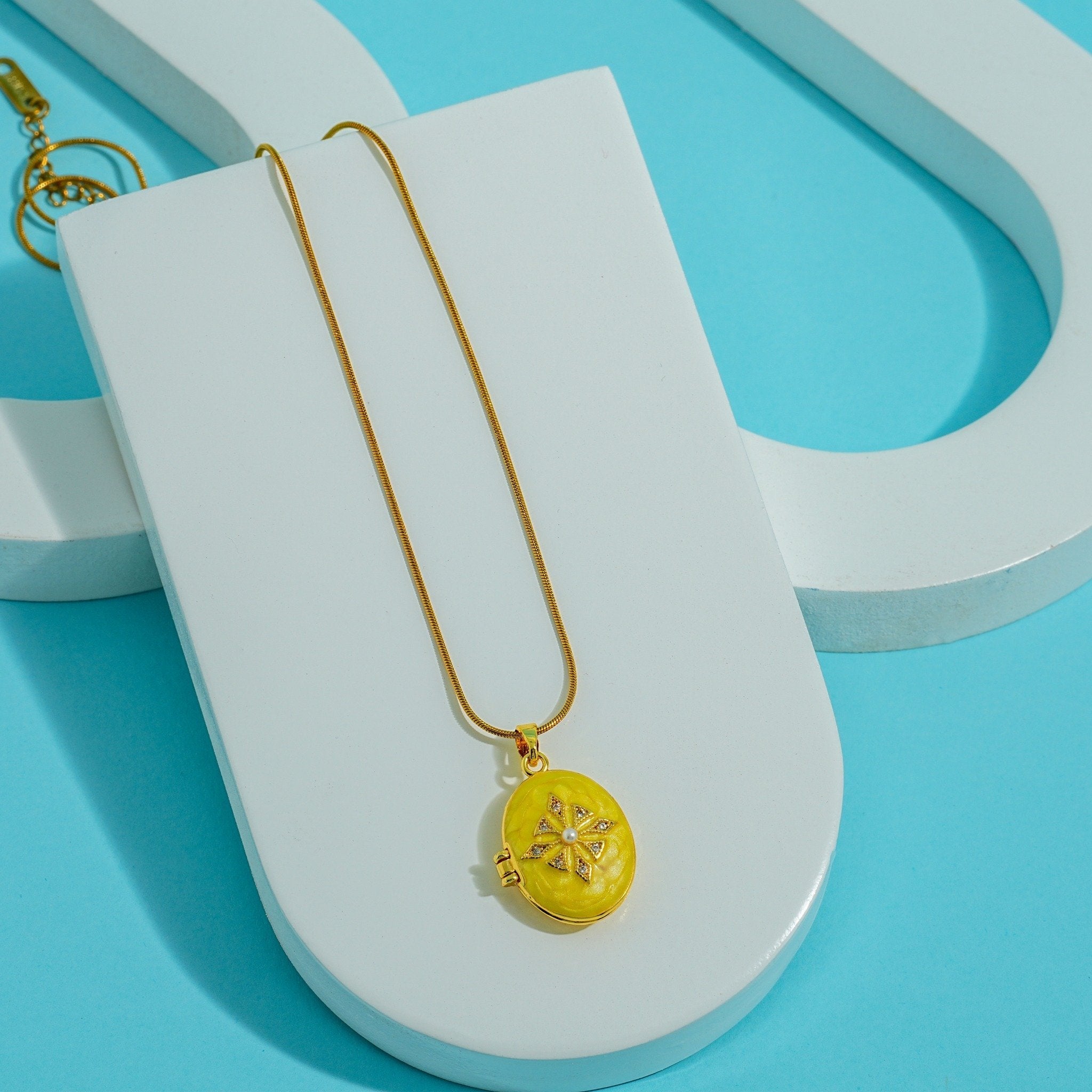 Golden Sunburst Locket Necklace